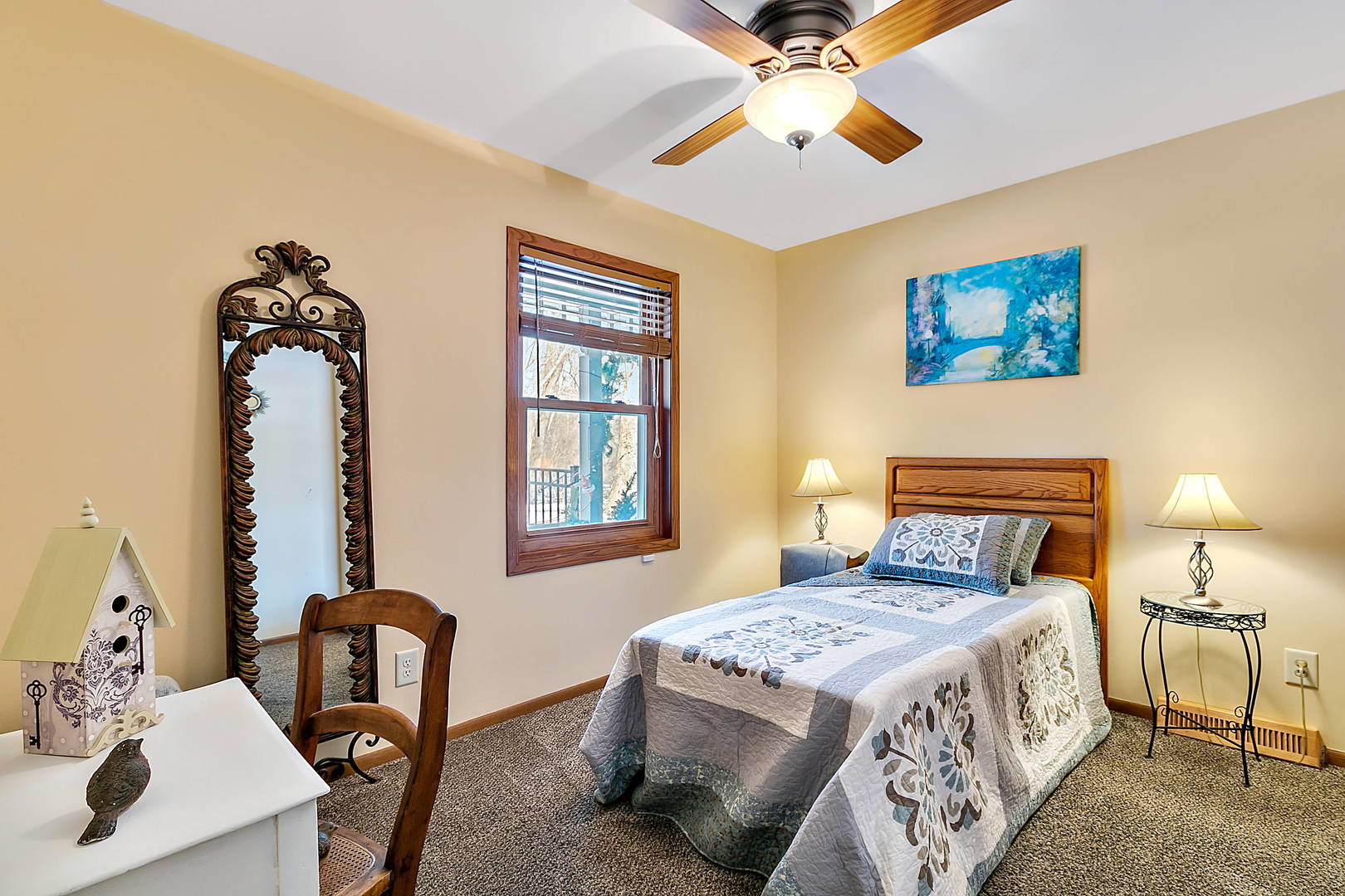 3320 North Jugtown Road Morris, IL 60450 - Photo 25 of 48 a bedroom with a bed and a chandelier