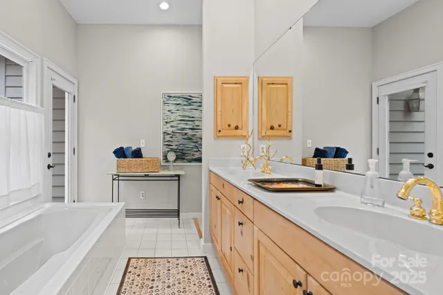 a balcony with furniture and a potted plant