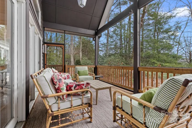 a spacious bedroom with a bed and a window