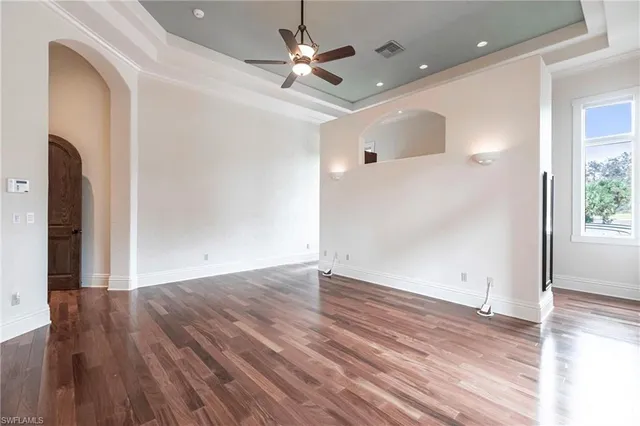 a view of kitchen with stainless steel appliances granite countertop cabinets and walk in closet