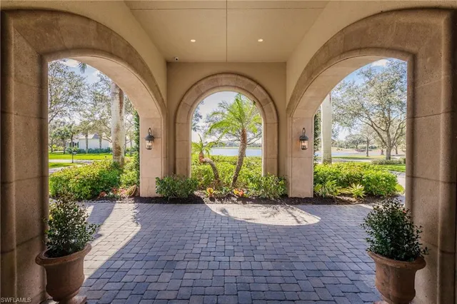 a view of a porch with a potted plant