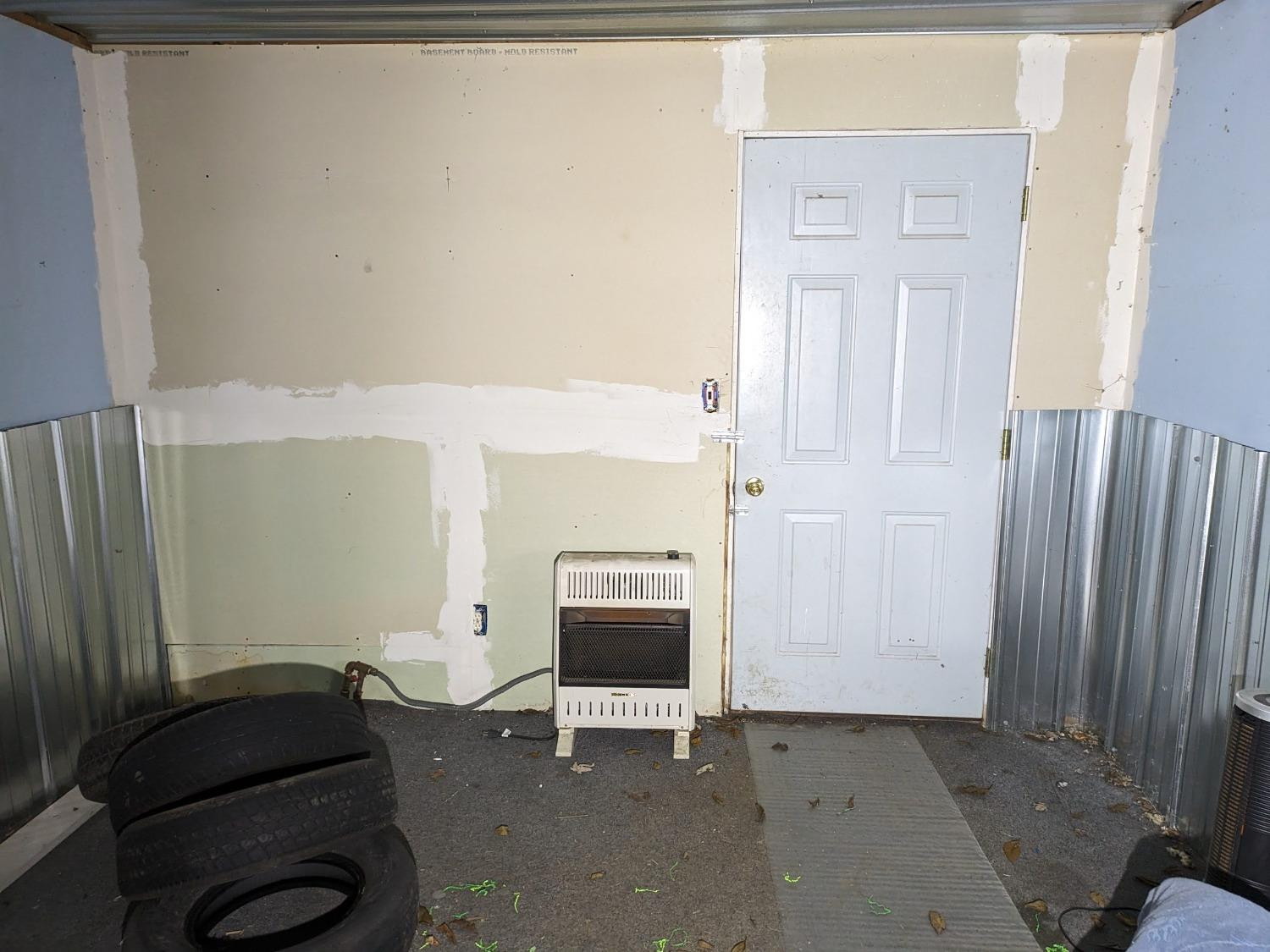 23809 Shelby Road Lowell, IN 46356 - Photo 36 of 48 a living room with furniture and a fireplace