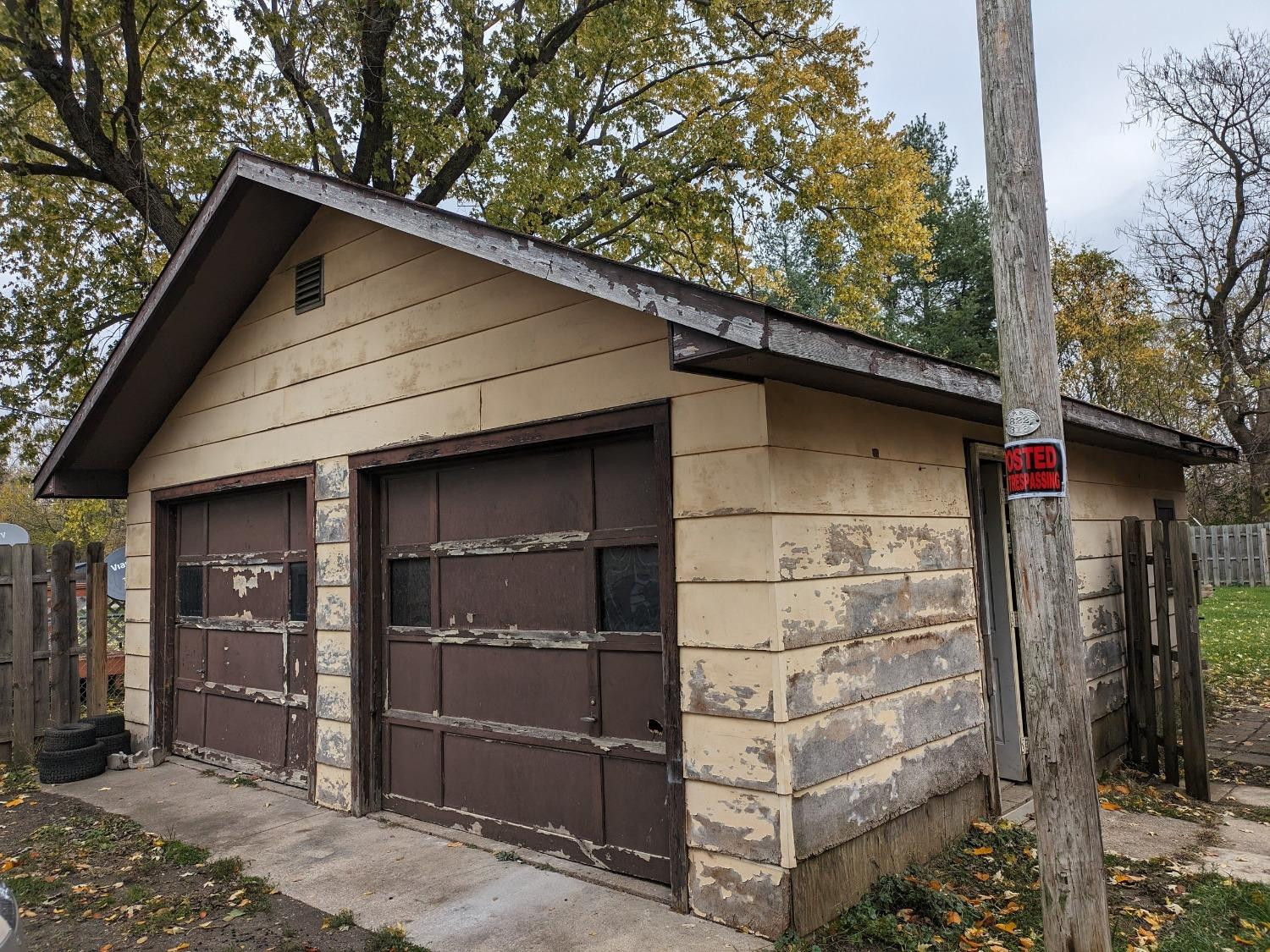 23809 Shelby Road Lowell, IN 46356 - Photo 4 of 48 a wooden house with trees in front of it
