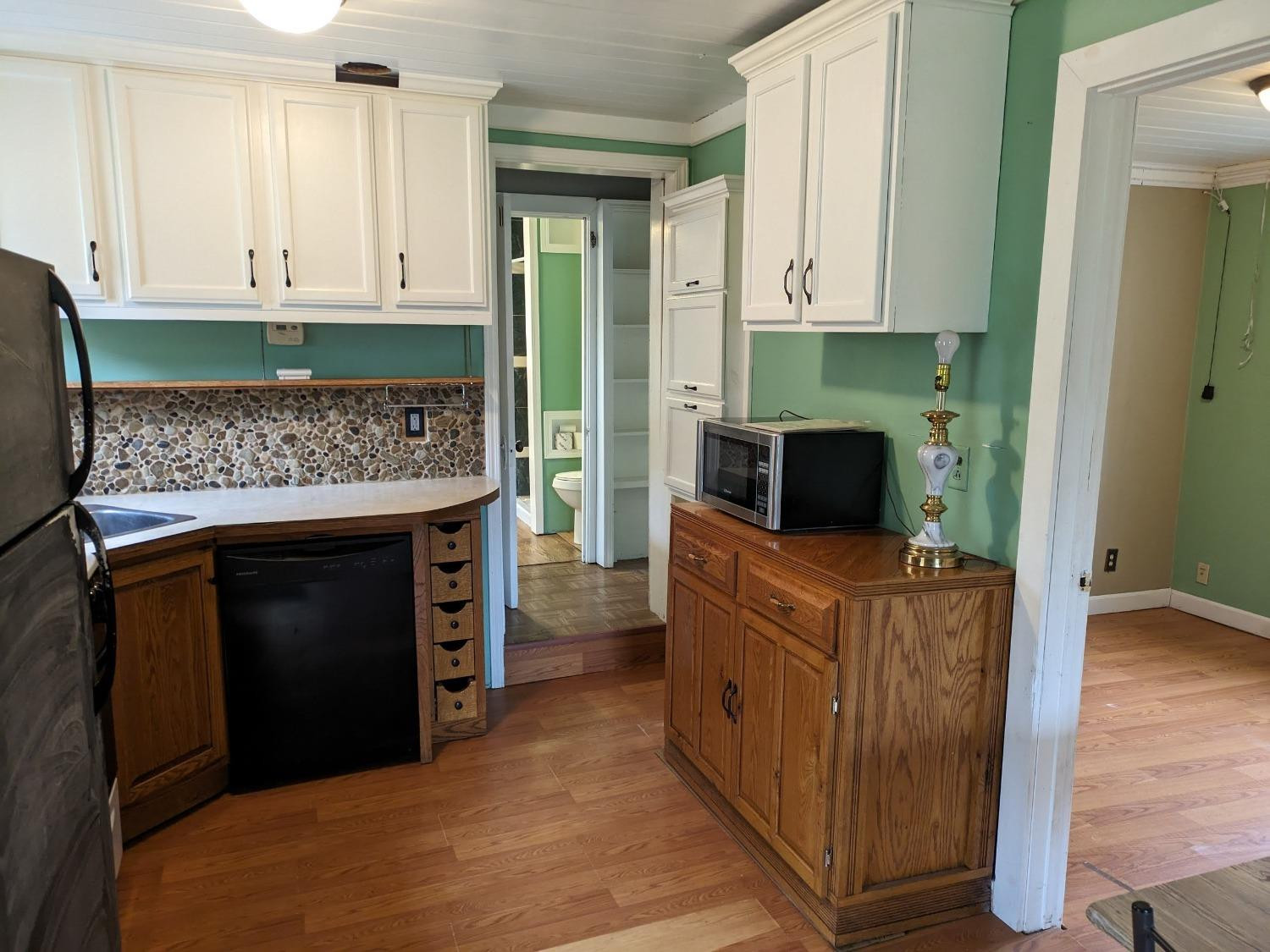 23809 Shelby Road Lowell, IN 46356 - Photo 10 of 48 a kitchen with stainless steel appliances granite countertop a stove and a refrigerator