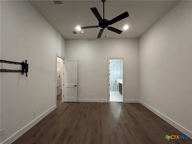 a view of a balcony with wooden floor