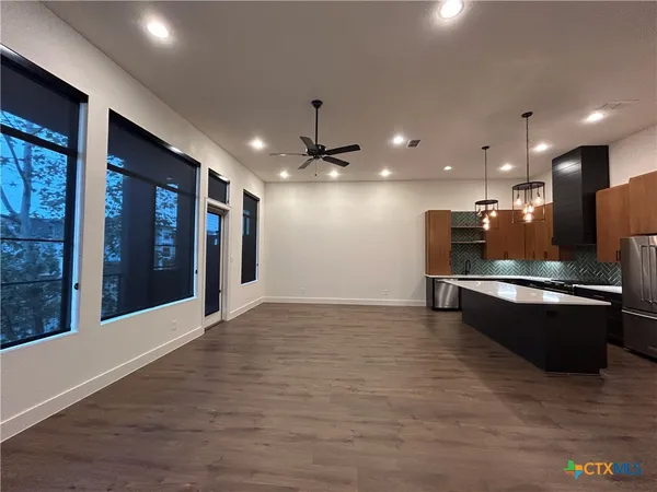 a lobby with a couch and a table