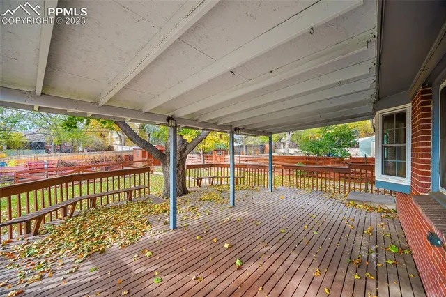 a view of porch with wooden floor