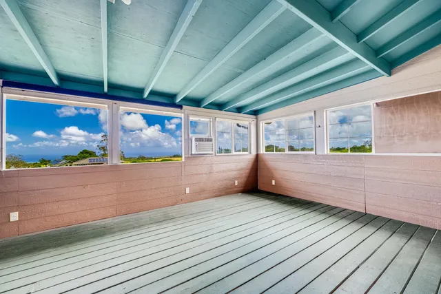 a view of a backyard of the house