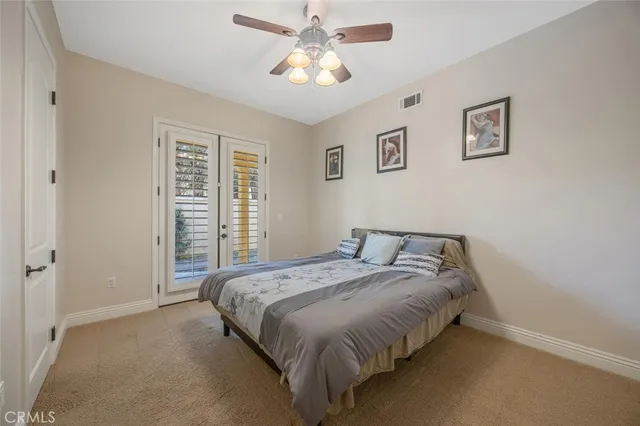 a view of a balcony with an outdoor seating