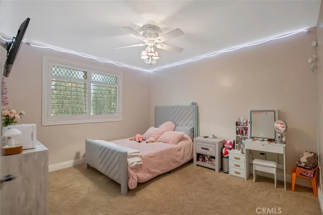 a view of a backyard with large trees