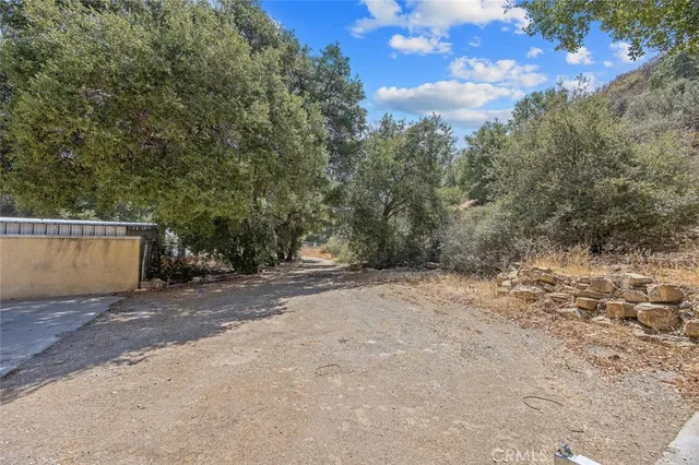 a aerial view of a house with table and chairs