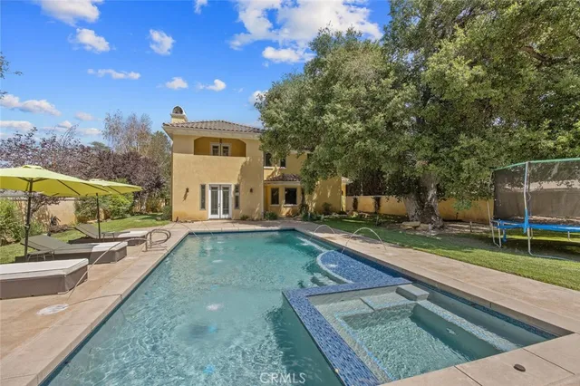 a view of outdoor space yard deck patio and swimming pool