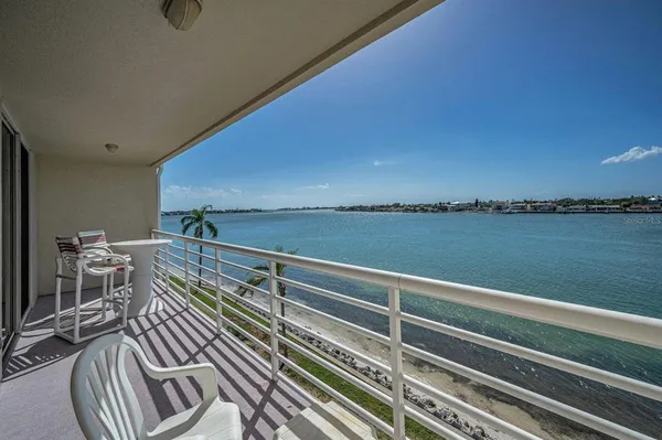 a view of a balcony with an outdoor space