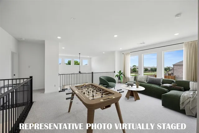 an empty room with a ceiling fan and window