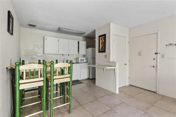 a view of kitchen with breakfast area