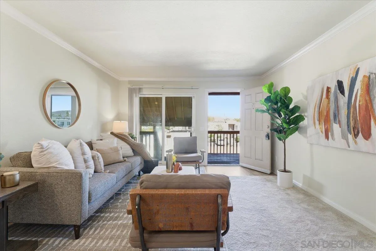 180 Chambers Street, Unit 21 El Cajon, CA 92020 - Photo 4 of 22 a bedroom with furniture and a potted plant
