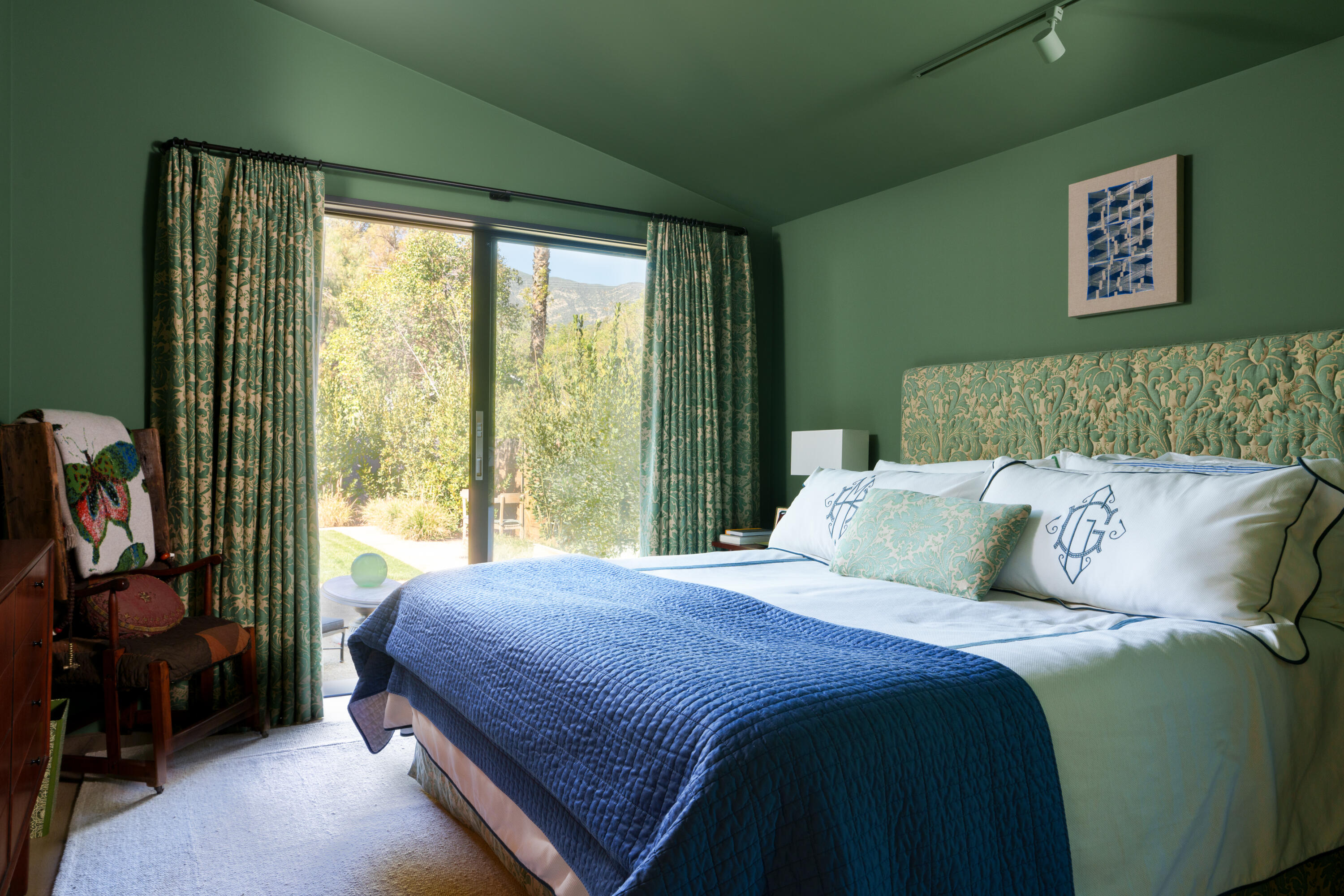 216 East Matilija Street Ojai, CA 93023 - Photo 11 of 22 a bed sitting in a bedroom next to a window