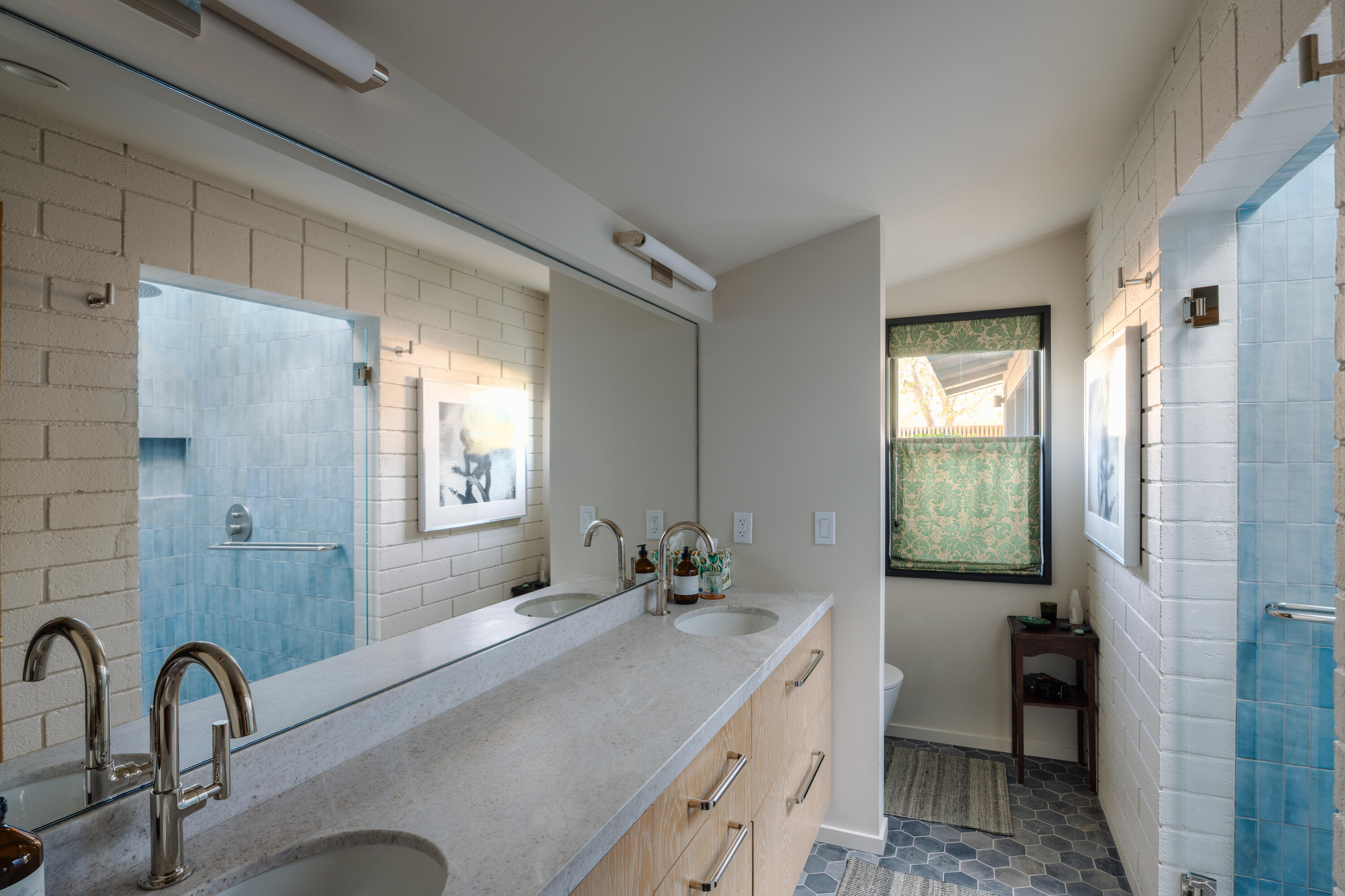 216 East Matilija Street Ojai, CA 93023 - Photo 13 of 22 a bathroom with a granite countertop sink a toilet and shower