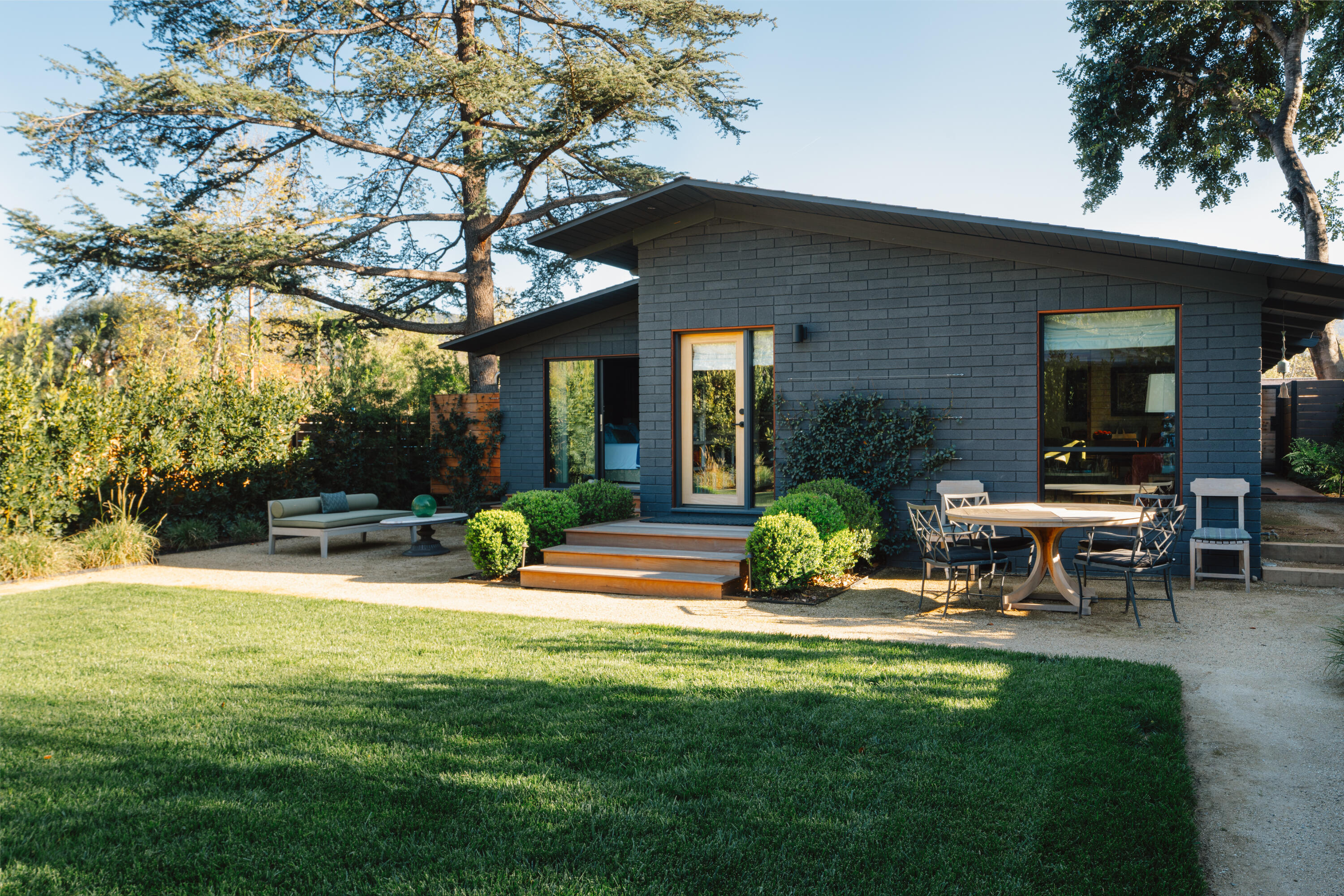 216 East Matilija Street Ojai, CA 93023 - Photo 19 of 22 a view of a house with backyard porch and sitting area