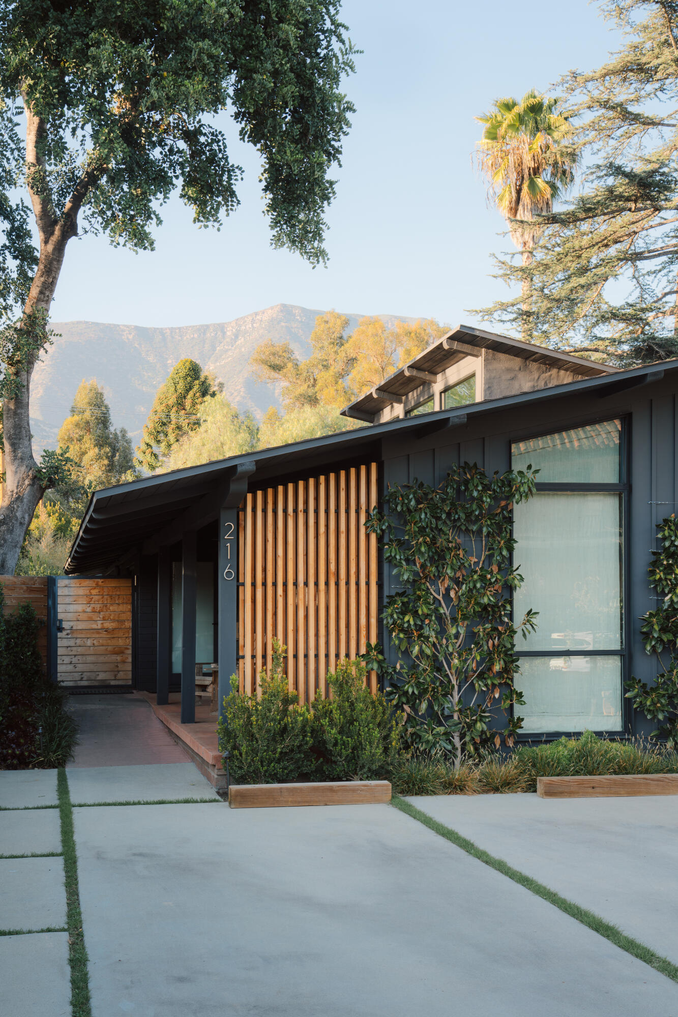 216 East Matilija Street Ojai, CA 93023 - Photo 2 of 22 a view of a house with a window and wooden fence