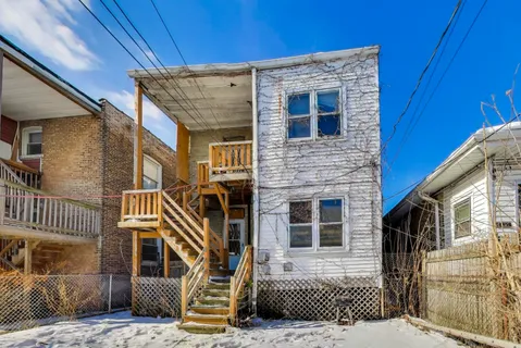 a front view of a house with a balcony
