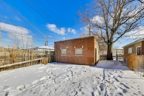 a view of a backyard of a house