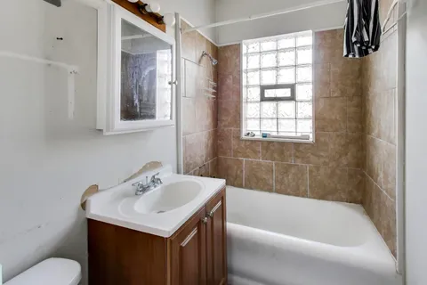 a bathroom with a sink and a bathtub
