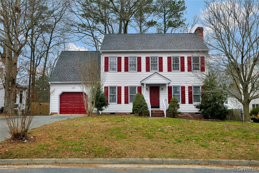 4106 Paces Ferry Road Chester, VA 23831 - Photo 1 of 23 a front view of a house with garden