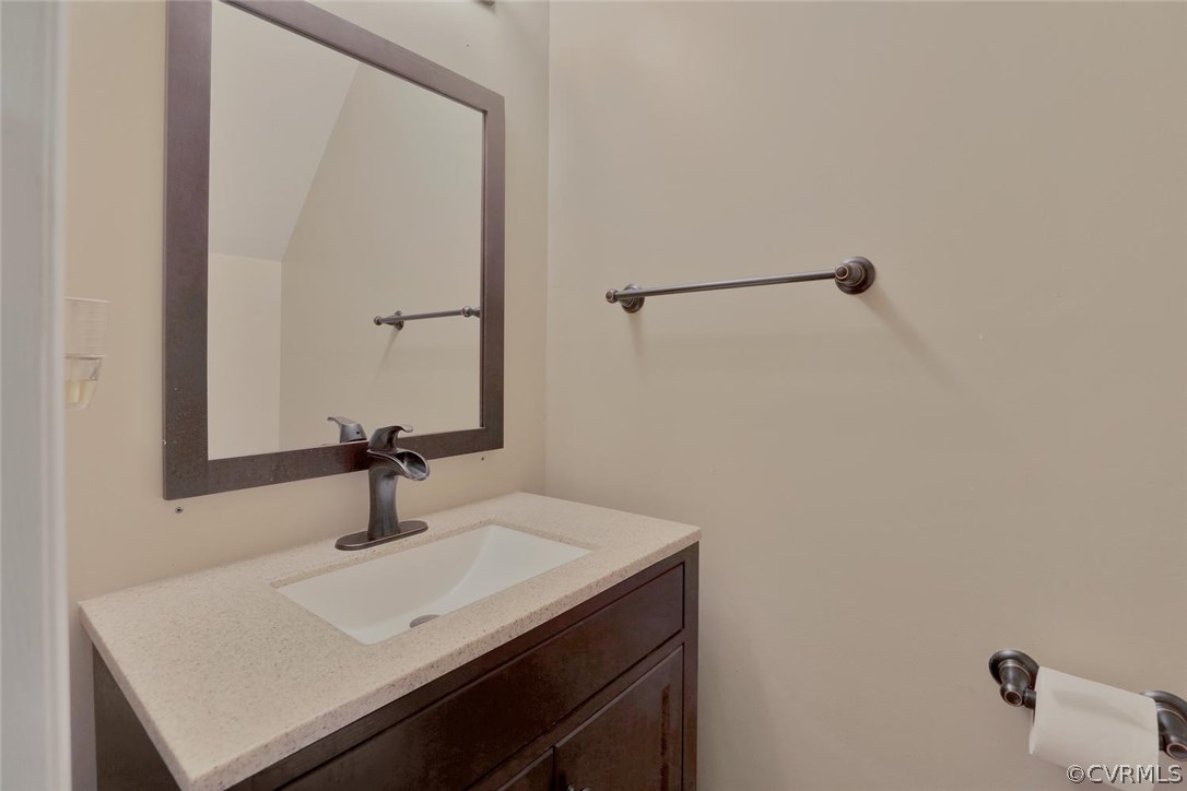 4106 Paces Ferry Road Chester, VA 23831 - Photo 12 of 23 a bathroom with a sink and a mirror