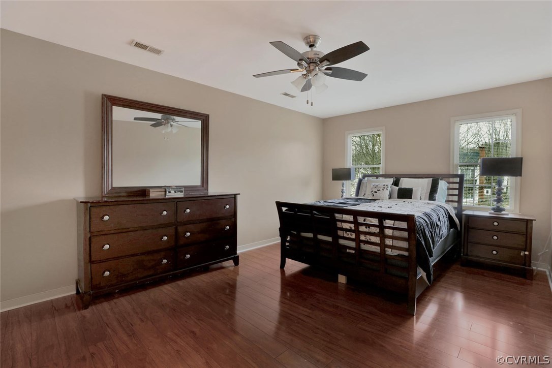 4106 Paces Ferry Road Chester, VA 23831 - Photo 13 of 23 a bedroom with a bed window and a mirror