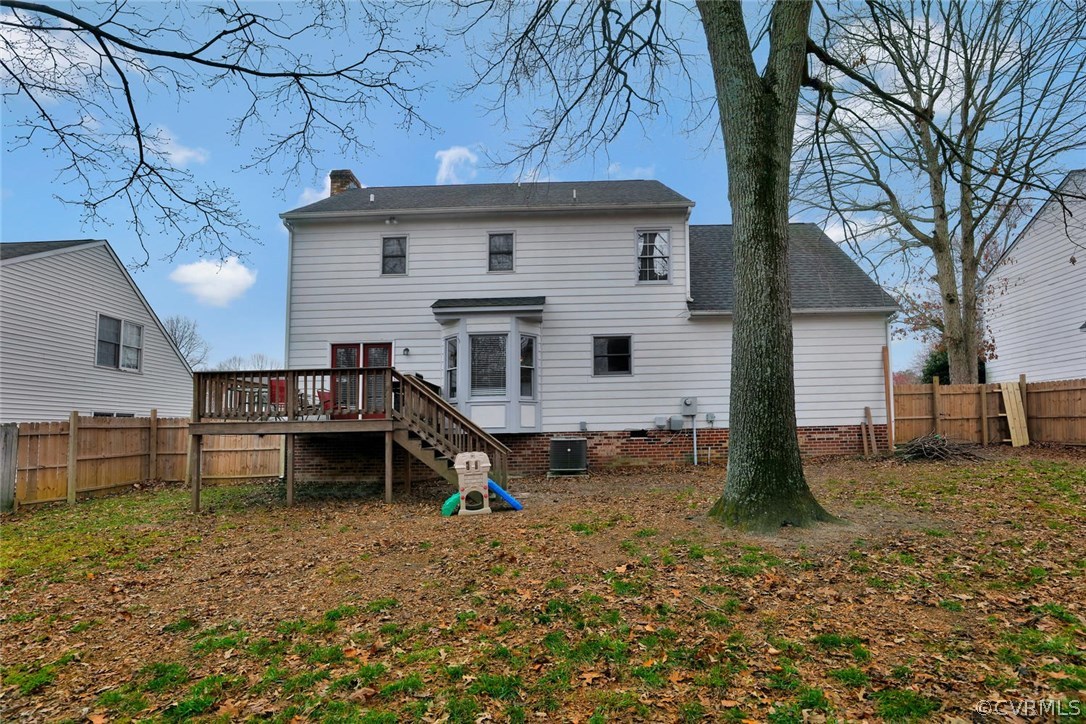 4106 Paces Ferry Road Chester, VA 23831 - Photo 22 of 23 a backyard of a house with barbeque oven table and chairs