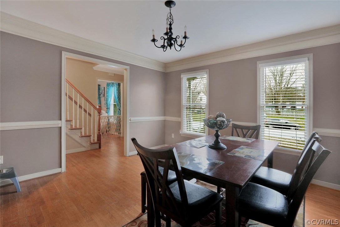 4106 Paces Ferry Road Chester, VA 23831 - Photo 3 of 23 a view of a dining room with furniture window and wooden floor
