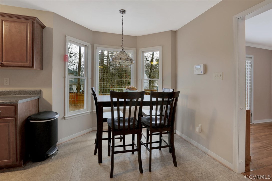 4106 Paces Ferry Road Chester, VA 23831 - Photo 7 of 23 a view of a dining room with furniture window and outside view