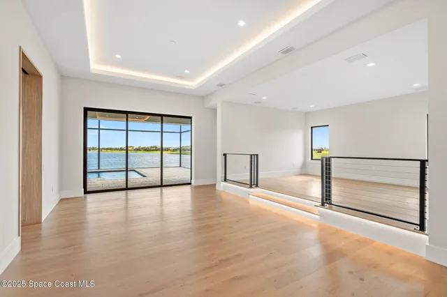 a room with cabinets and wooden floor