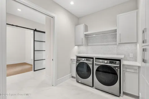 a bathroom with a sink toilet tub and shower