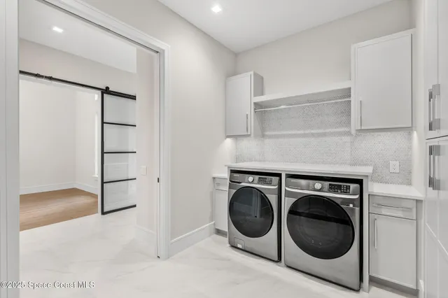 a bathroom with a sink toilet tub and shower