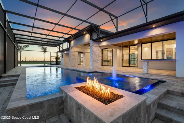 a view of an empty room with a fireplace