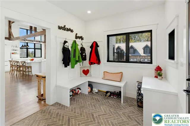 a group of people sitting in a living room