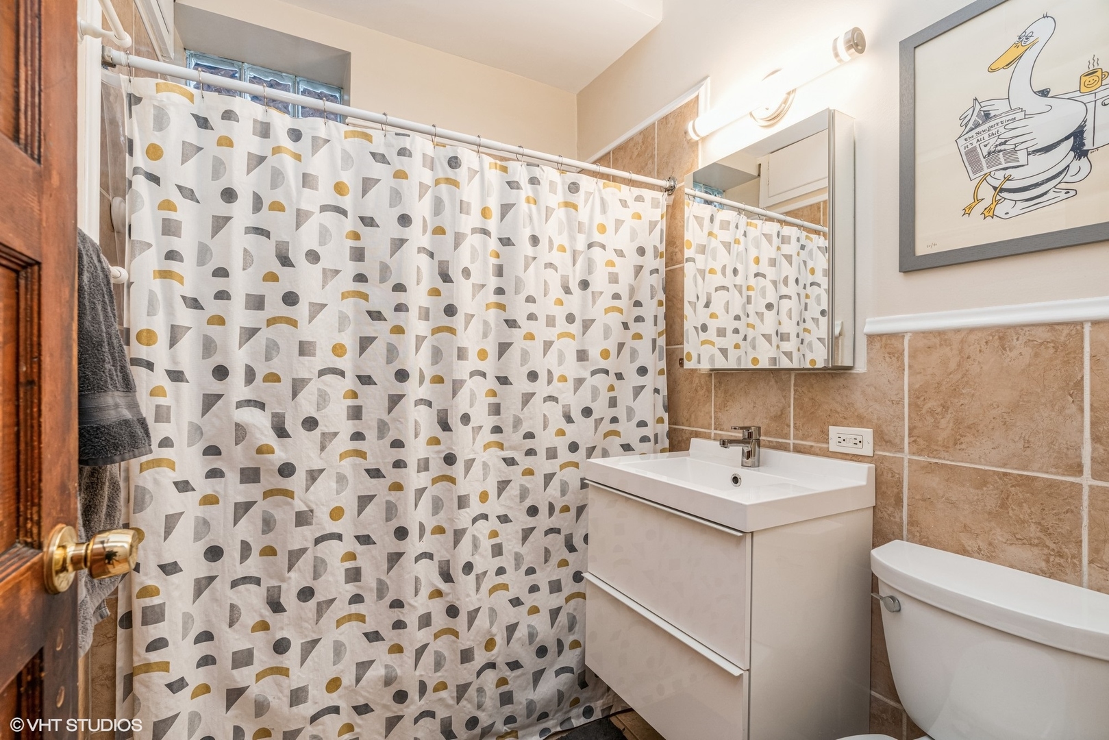 Undisclosed Address Chicago, IL 60622 - Photo 11 of 11 a bathroom with a sink toilet and shower