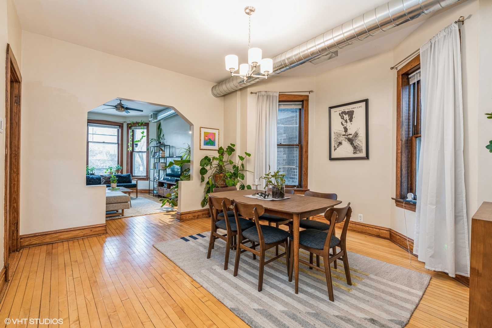 Undisclosed Address Chicago, IL 60622 - Photo 7 of 11 a view of a dining room with furniture window and wooden floor