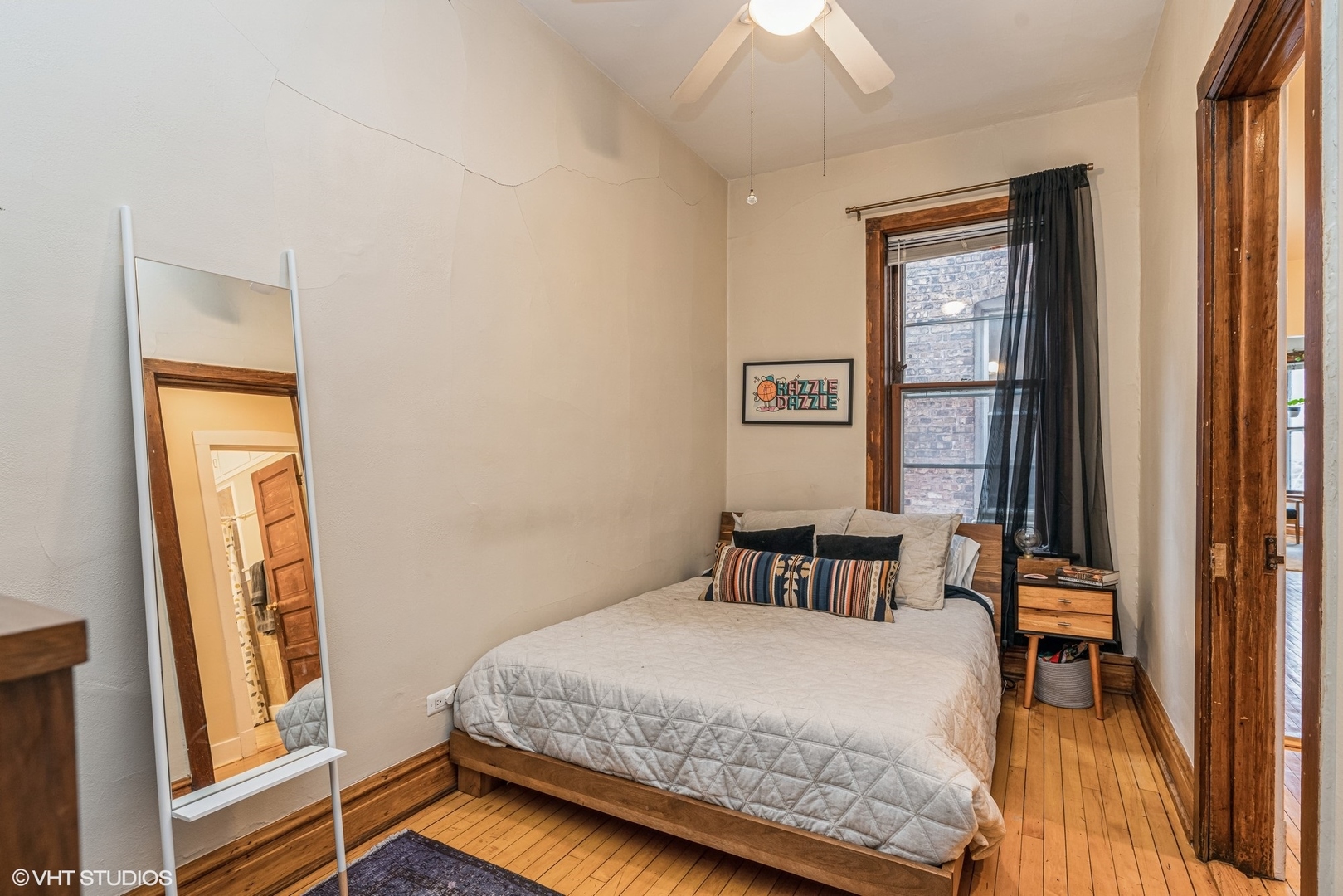 Undisclosed Address Chicago, IL 60622 - Photo 9 of 11 a bedroom with a bed and a window