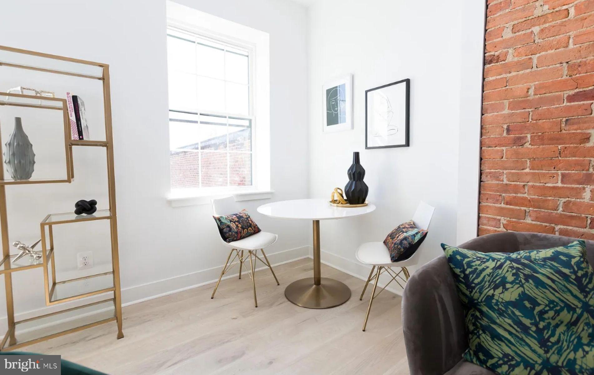 415 St Paul Street, Unit 403 Baltimore, MD 21202 - Photo 4 of 12 Sitting Area - Model Home