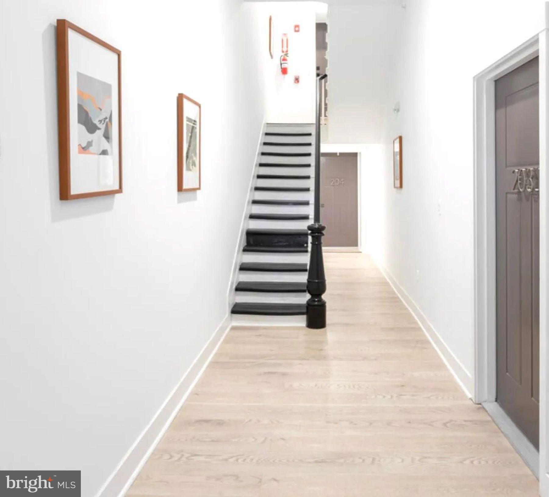 415 St Paul Street, Unit 403 Baltimore, MD 21202 - Photo 10 of 12 Interior Building Hallway