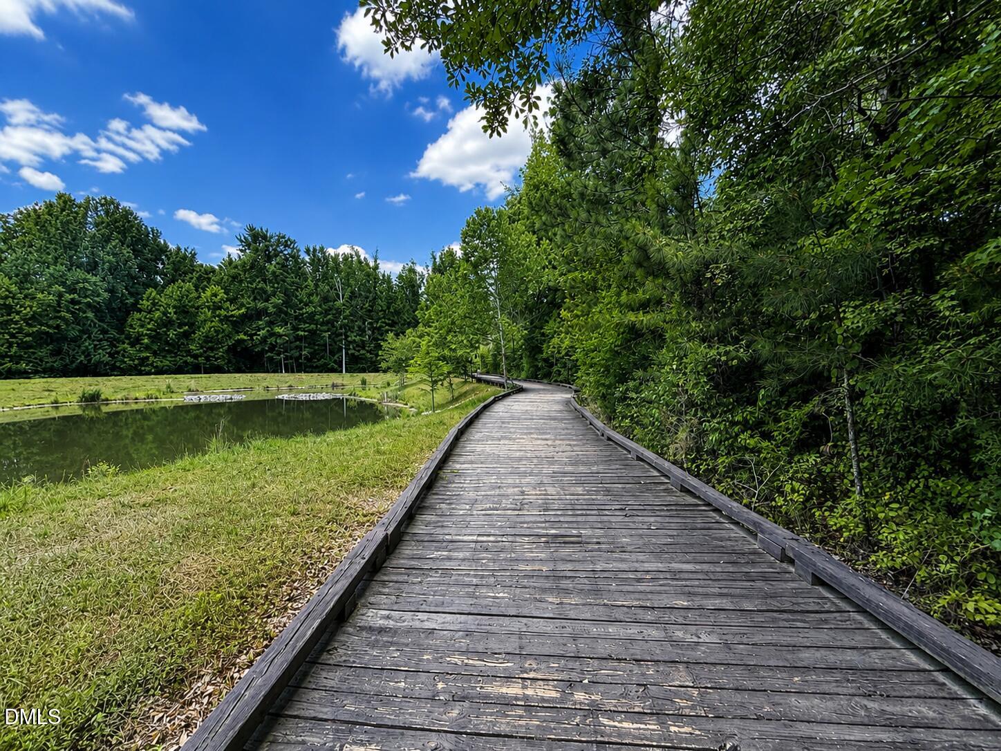 1808 Austin Rdg Parkway Wake Forest, NC 27587 - Photo 55 of 57 a view of a wooden deck with a yard