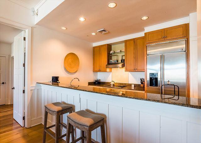99 Compass Point Way South, Unit 304 Inlet Beach, FL 32461 - Photo 14 of 32 a large kitchen with a table and chairs