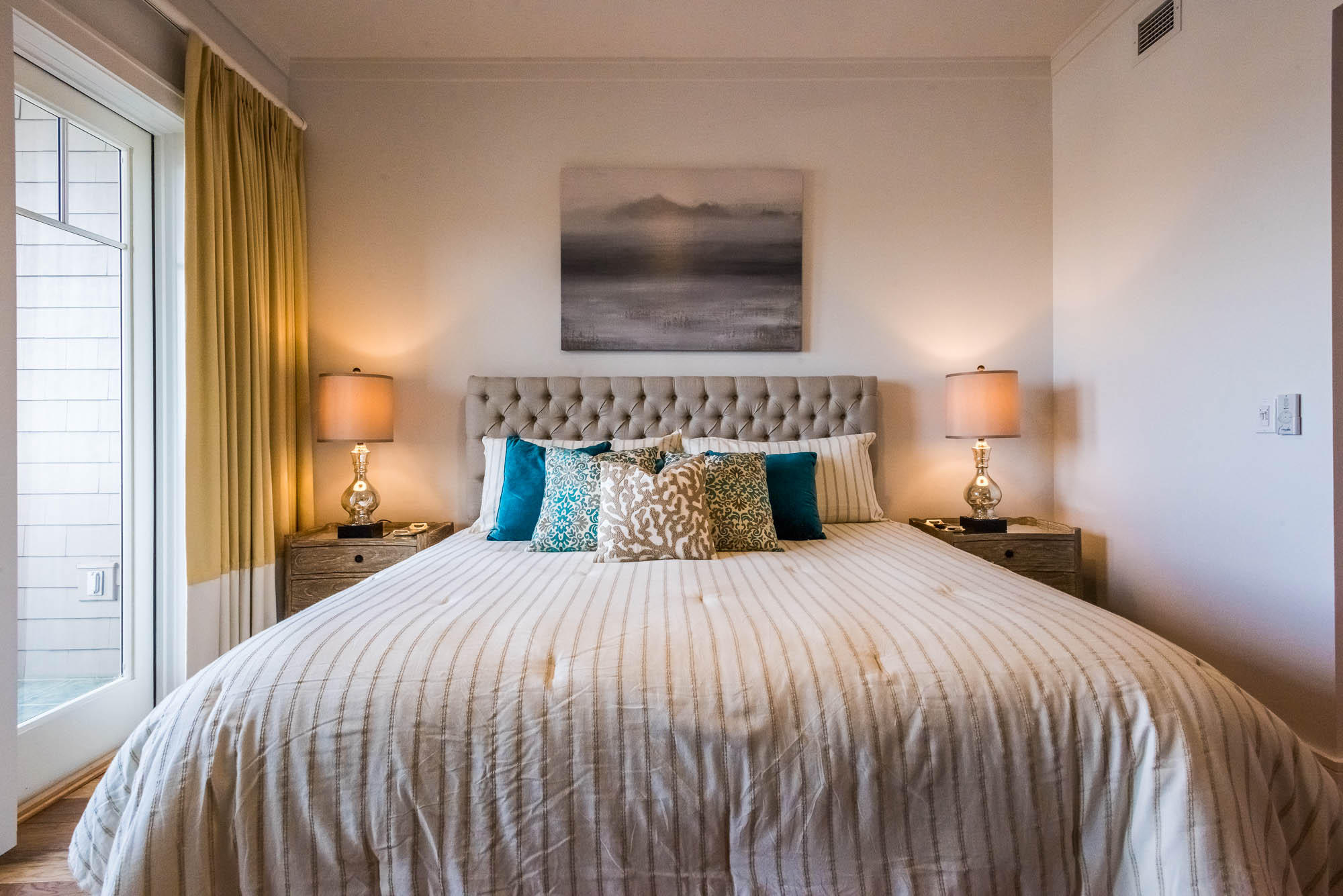 99 Compass Point Way South, Unit 304 Inlet Beach, FL 32461 - Photo 18 of 32 a bedroom with a bed and a lamp