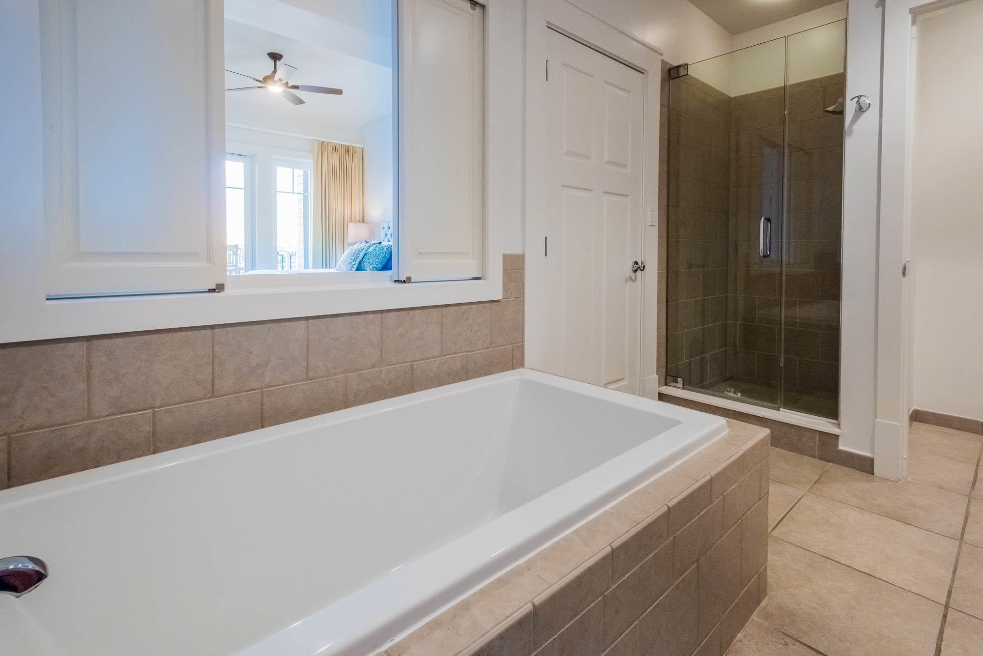 99 Compass Point Way South, Unit 304 Inlet Beach, FL 32461 - Photo 21 of 32 a bathroom with a bathtub and a shower