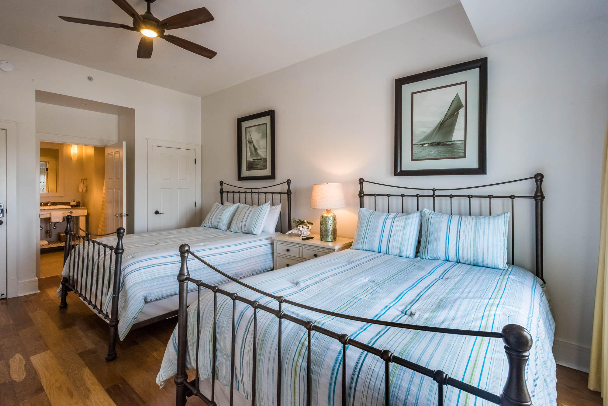 99 Compass Point Way South, Unit 304 Inlet Beach, FL 32461 - Photo 24 of 32 a bedroom with a bed and window