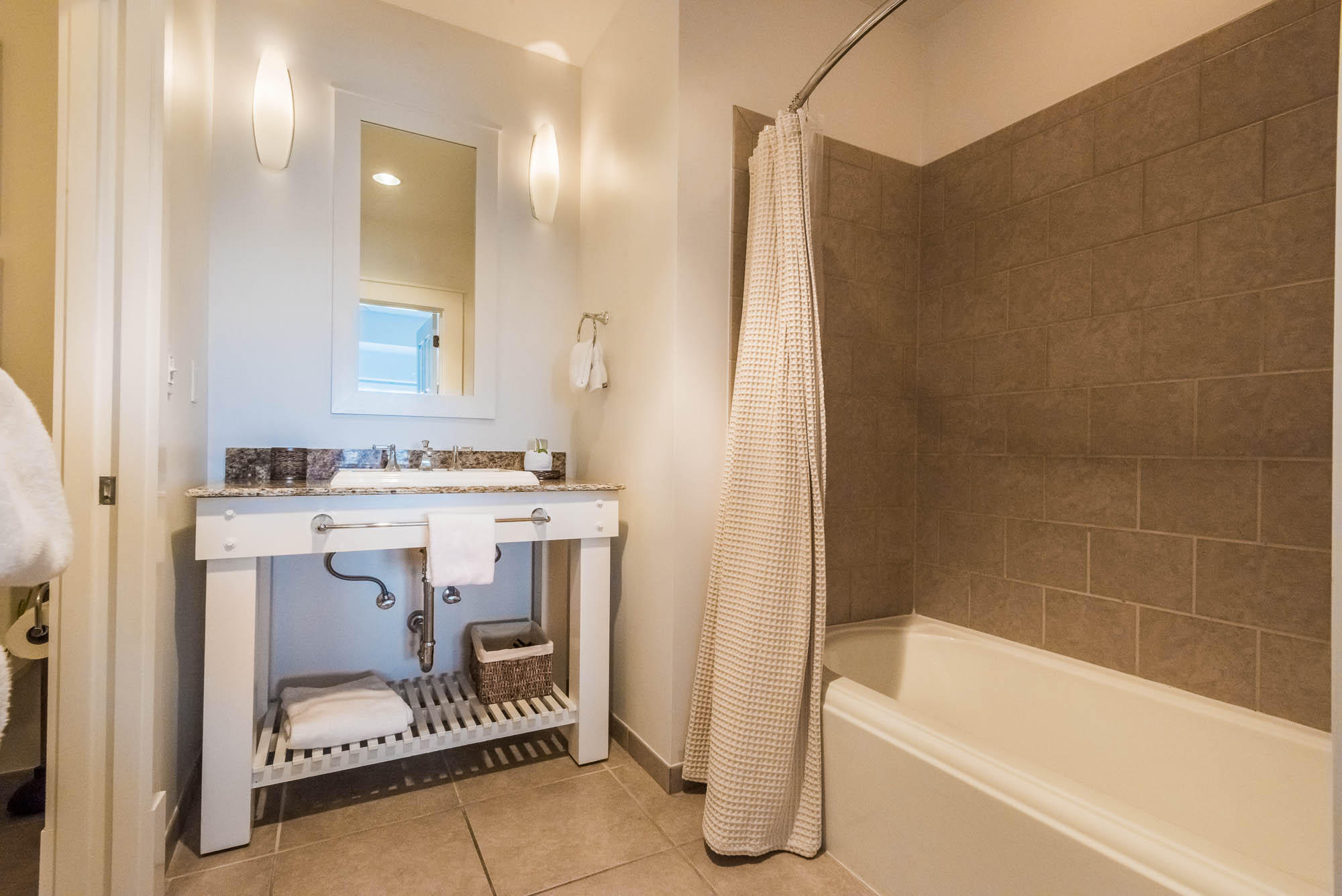 99 Compass Point Way South, Unit 304 Inlet Beach, FL 32461 - Photo 28 of 32 a bathroom with a sink and a mirror