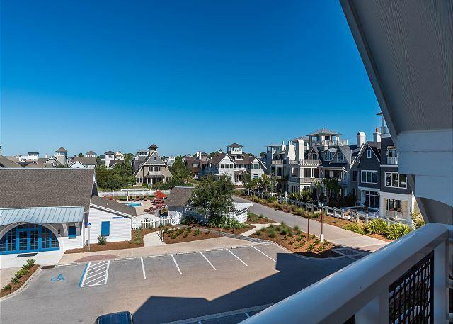 99 Compass Point Way South, Unit 304 Inlet Beach, FL 32461 - Photo 31 of 32 a view of a balcony with chairs